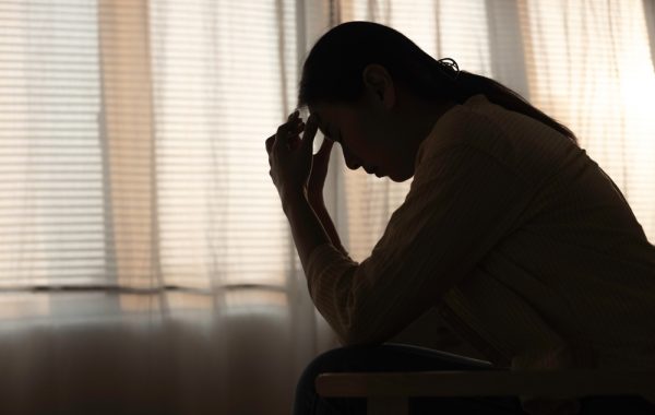Female,Having,Depression,Sitting,Alone,In,Bedroom,Dark,Corner.,Woman